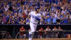 KANSAS CITY, MO - AUGUST 14: Eric Hosmer #35 of the Kansas City Royals runs to first hatter hitting a two-run home run against the Los Angeles Angels of Anaheim in the sixth inning at Kauffman Stadium on August 14, 2015 in Kansas City, Missouri. (Photo by Ed Zurga/Getty Images) *** Local Caption *** Eric Hosmer