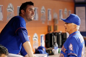 New York Mets starting pitcher Matt Harvey, left, speaks with manager Terry Collins in the dugout after he left the baseball game with the Miami Marlins in the eighth inning in Miami, Wednesday, Aug. 5, 2015. The Mets won 8-6. (AP Photo/Joe Skipper)